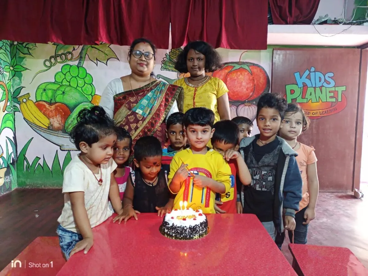 Children sharing a birthday celebration at school