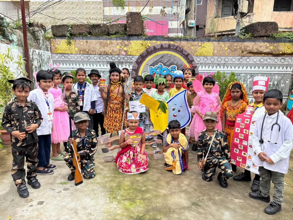 Children gathered in colourful fancy-dress costumes at Kids Planet, Bhubaneswar